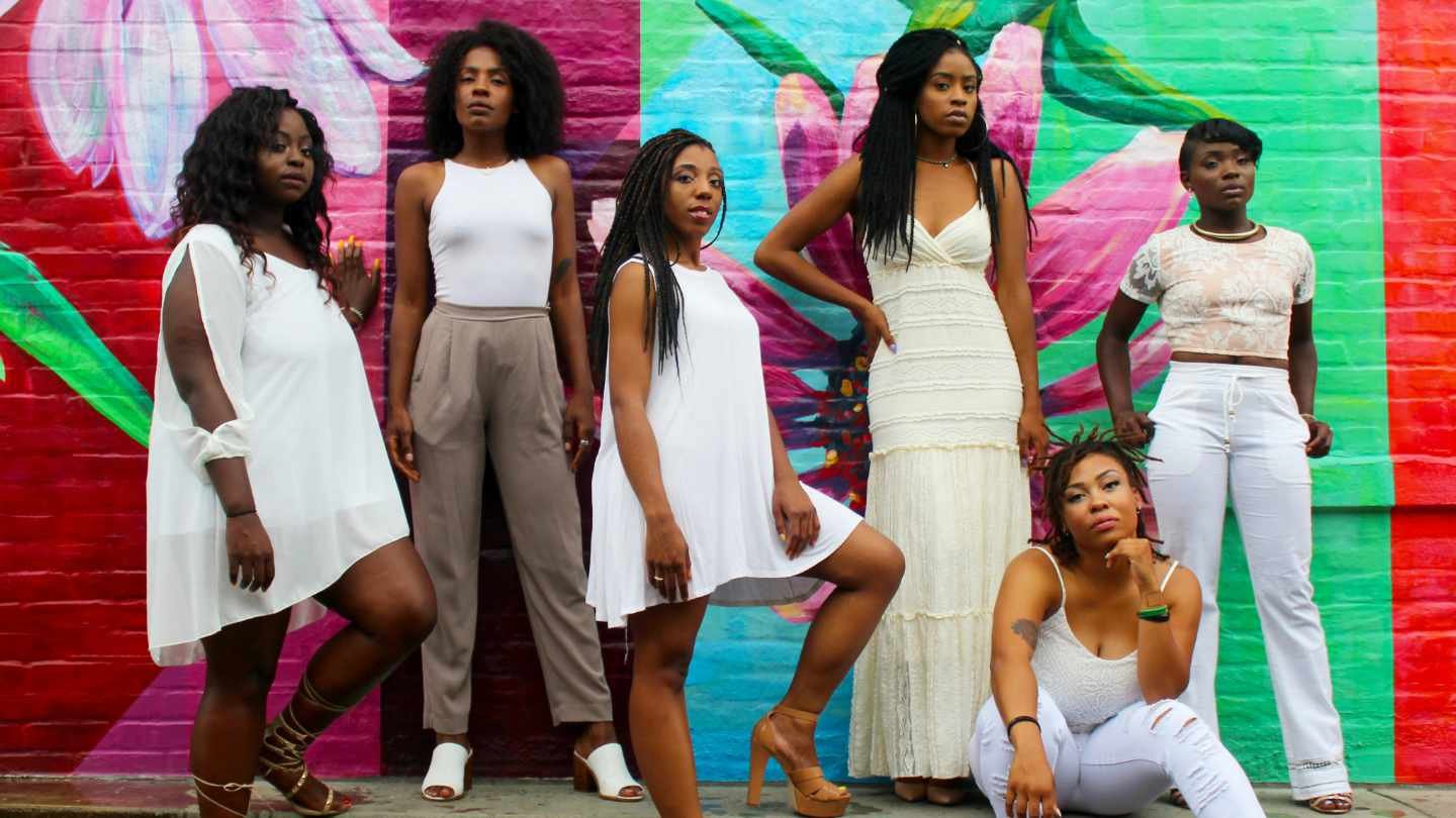 A Group of Stylishly Dressed Woman